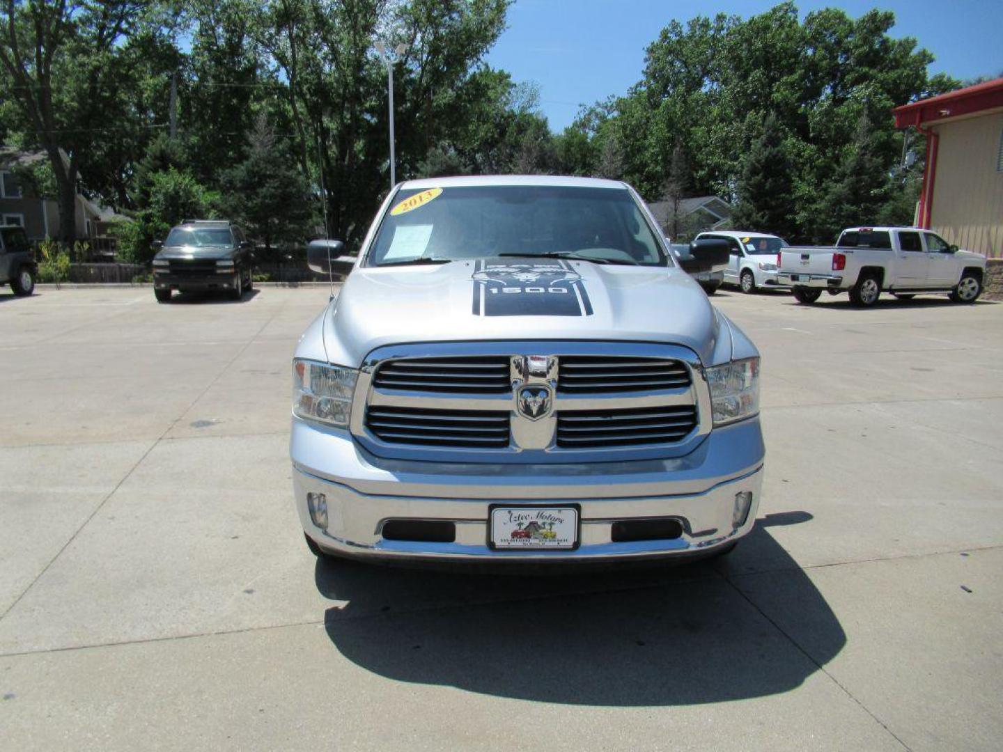 2013 SILVER RAM QUAD CAB 1500 SLT (1C6RR7GT6DS) with an 5.7L engine, Automatic transmission, located at 908 SE 14th Street, Des Moines, IA, 50317, (515) 281-0330, 41.580303, -93.597046 - Photo#1