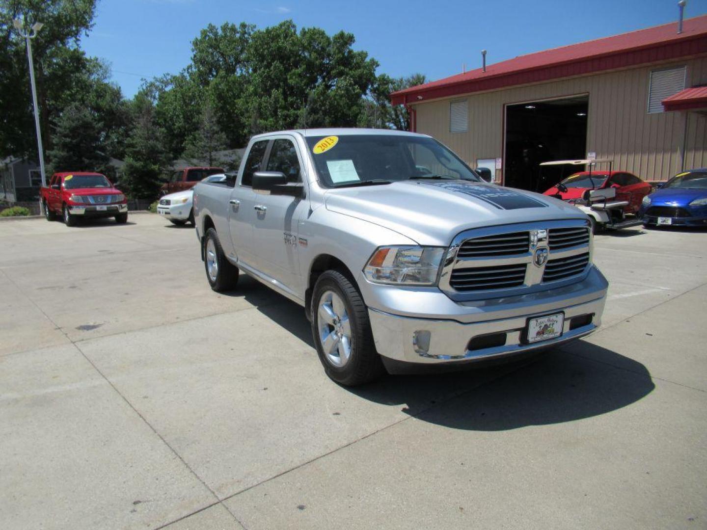 2013 SILVER RAM QUAD CAB 1500 SLT (1C6RR7GT6DS) with an 5.7L engine, Automatic transmission, located at 908 SE 14th Street, Des Moines, IA, 50317, (515) 281-0330, 41.580303, -93.597046 - Photo#2