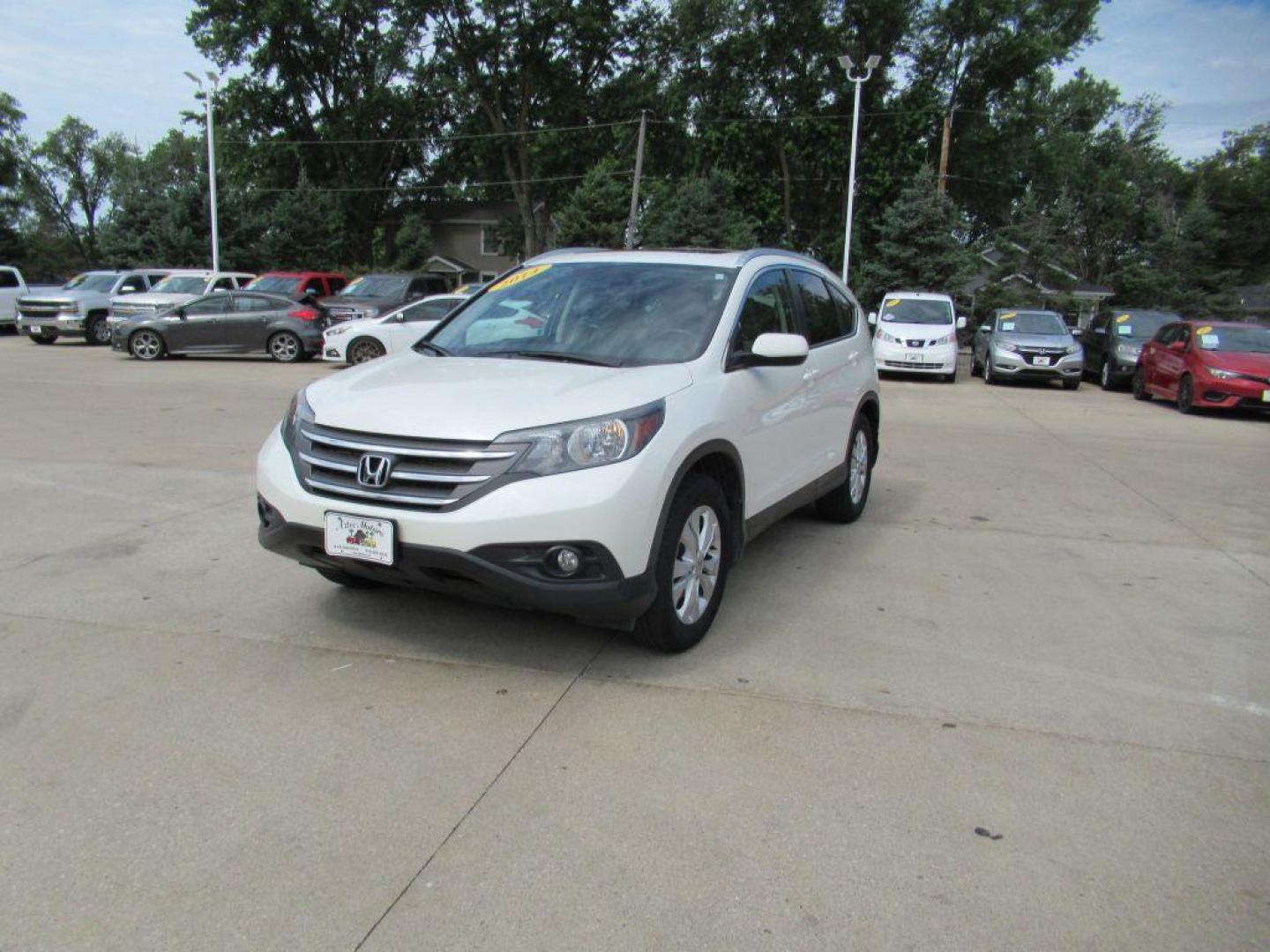 2014 WHITE HONDA CR-V EXL (5J6RM4H78EL) with an 2.4L engine, Automatic transmission, located at 908 SE 14th Street, Des Moines, IA, 50317, (515) 281-0330, 41.580303, -93.597046 - Photo#0