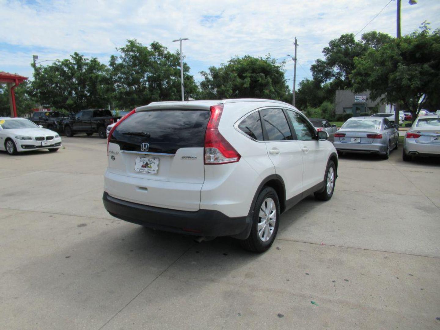 2014 WHITE HONDA CR-V EXL (5J6RM4H78EL) with an 2.4L engine, Automatic transmission, located at 908 SE 14th Street, Des Moines, IA, 50317, (515) 281-0330, 41.580303, -93.597046 - Photo#4