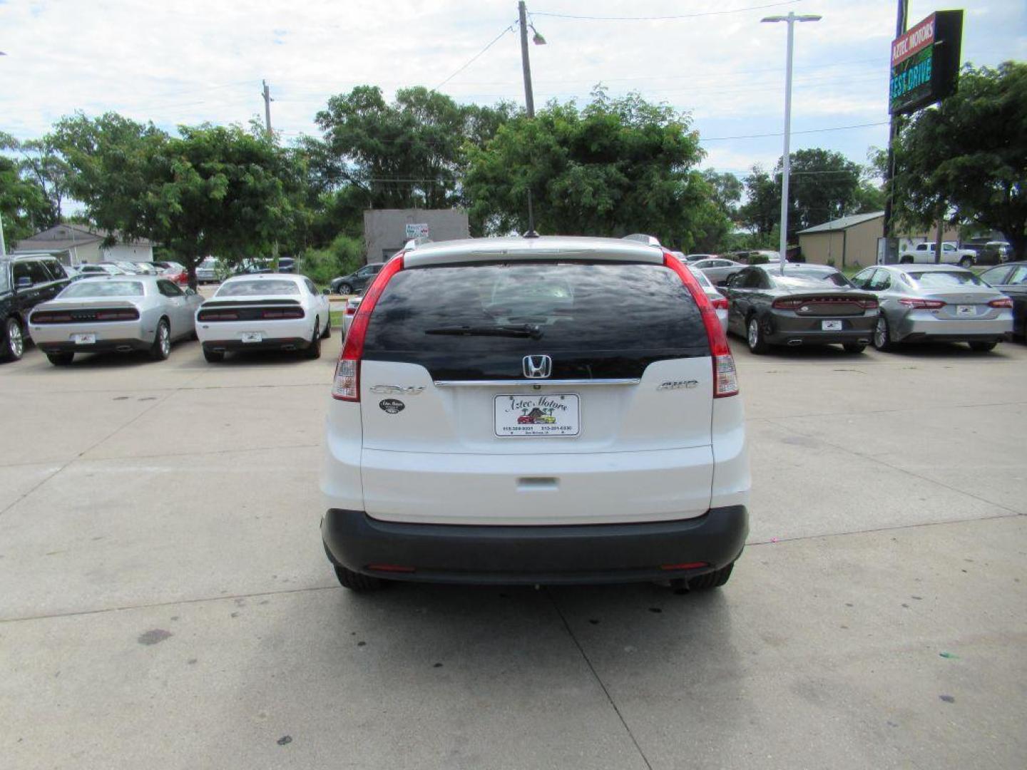 2014 WHITE HONDA CR-V EXL (5J6RM4H78EL) with an 2.4L engine, Automatic transmission, located at 908 SE 14th Street, Des Moines, IA, 50317, (515) 281-0330, 41.580303, -93.597046 - Photo#5