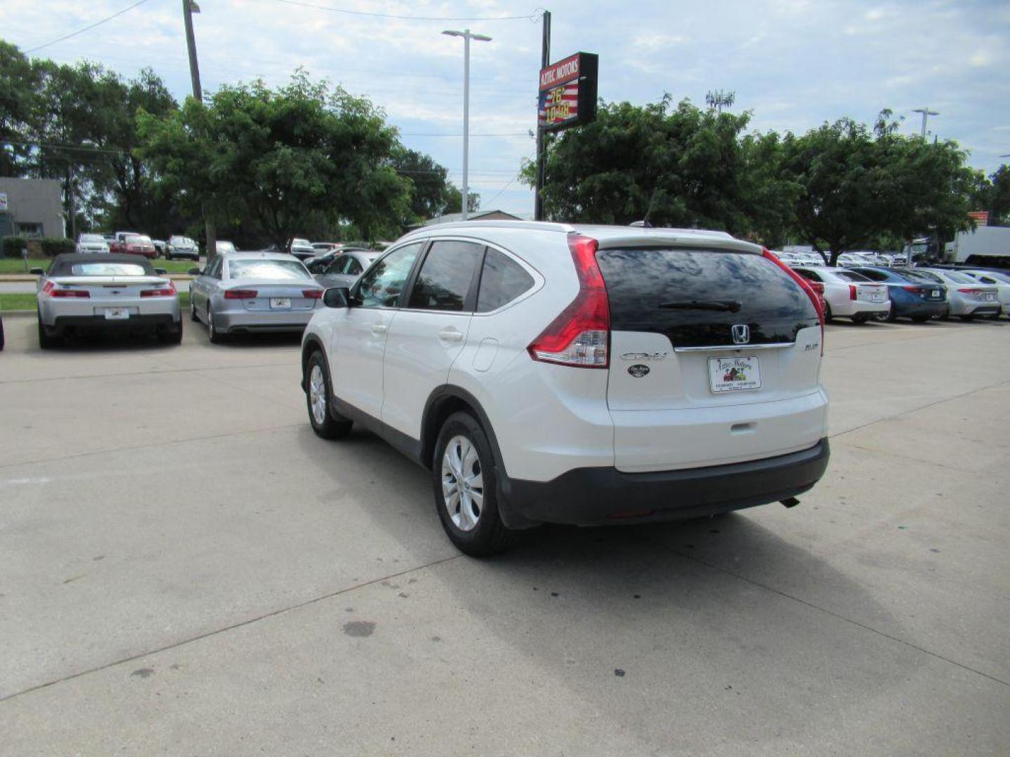 2014 WHITE HONDA CR-V EXL (5J6RM4H78EL) with an 2.4L engine, Automatic transmission, located at 908 SE 14th Street, Des Moines, IA, 50317, (515) 281-0330, 41.580303, -93.597046 - Photo#6