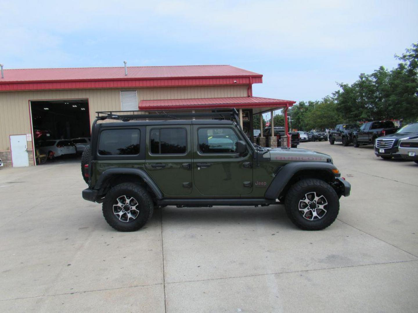 2021 GRREN JEEP WRANGLER UNLIMI RUBICON (1C4JJXFMXMW) with an 3.0L engine, Automatic transmission, located at 908 SE 14th Street, Des Moines, IA, 50317, (515) 281-0330, 41.580303, -93.597046 - Photo#3