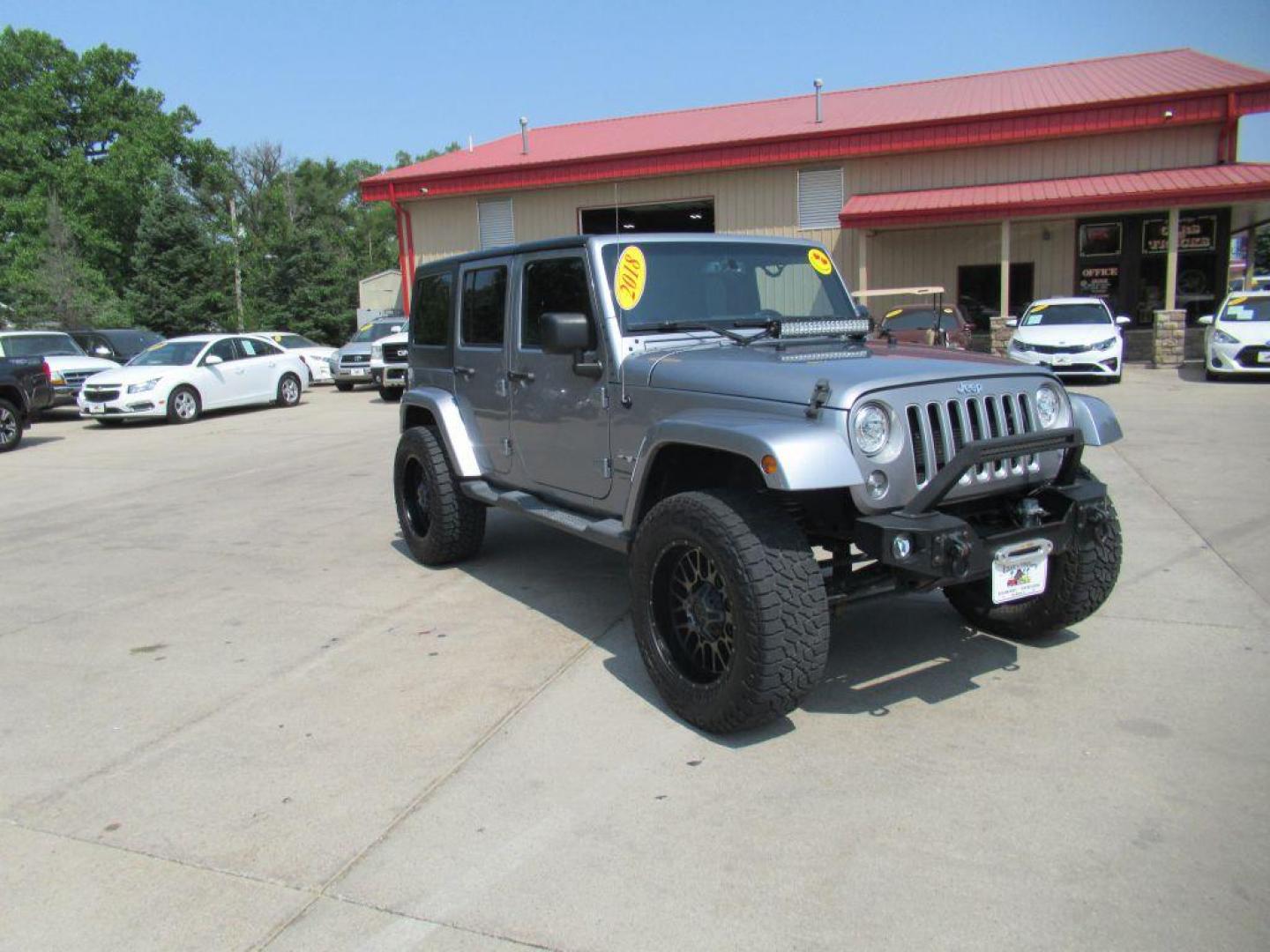 2018 SILVER JEEP WRANGLER UNLIMI SAHARA (1C4BJWEG2JL) with an 3.6L engine, Automatic transmission, located at 908 SE 14th Street, Des Moines, IA, 50317, (515) 281-0330, 41.580303, -93.597046 - Photo#2