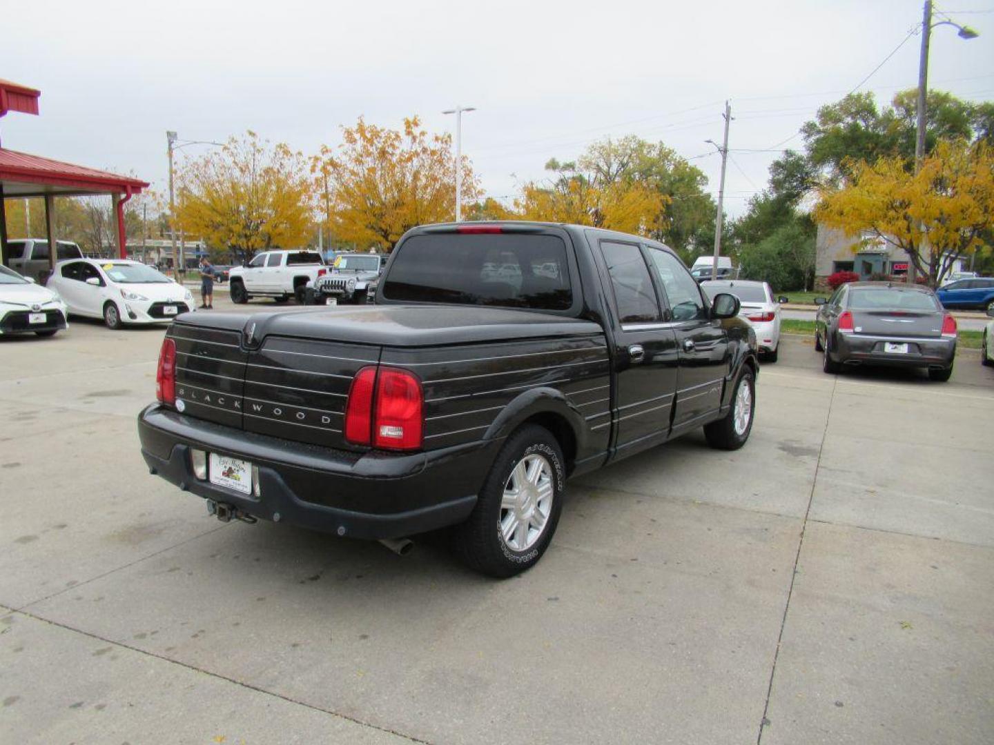 2002 BLACK LINCOLN BLACKWOOD (5LTEW05A32K) with an 5.4L engine, Automatic transmission, located at 908 SE 14th Street, Des Moines, IA, 50317, (515) 281-0330, 41.580303, -93.597046 - Photo#4