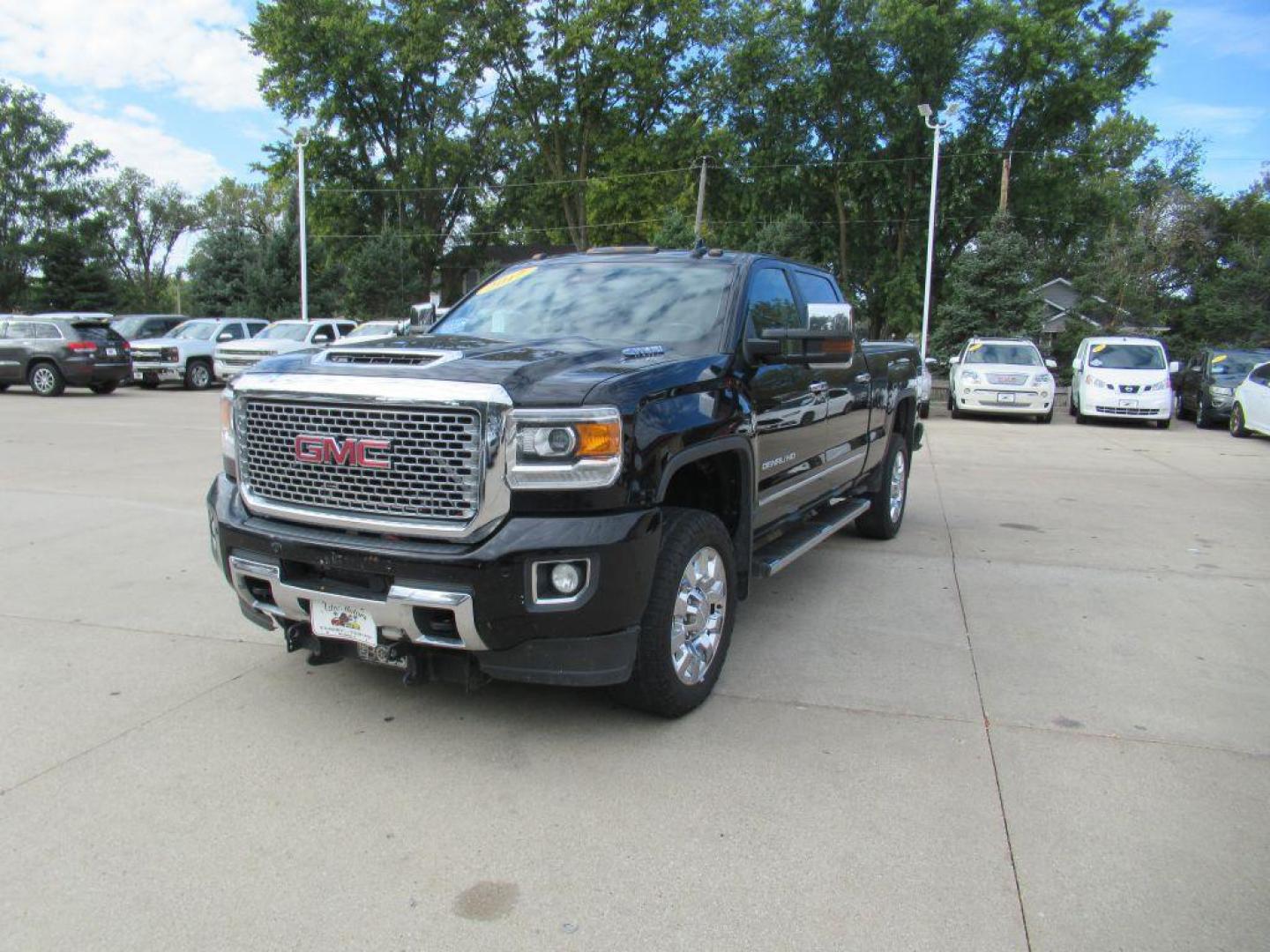 2017 BLACK GMC SIERRA 2500 DENALI (1GT12UEY4HF) with an 6.6L engine, Automatic transmission, located at 908 SE 14th Street, Des Moines, IA, 50317, (515) 281-0330, 41.580303, -93.597046 - Photo#0