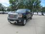 2017 BLACK GMC SIERRA 2500 DENALI (1GT12UEY4HF) with an 6.6L engine, Automatic transmission, located at 908 SE 14th Street, Des Moines, IA, 50317, (515) 281-0330, 41.580303, -93.597046 - Photo#0