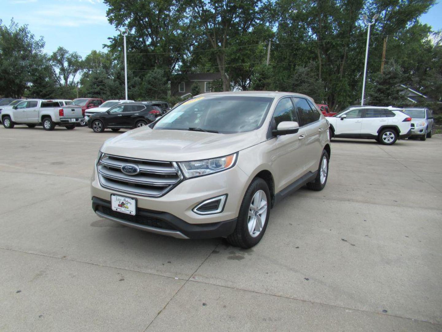 2018 GOLD FORD EDGE SEL (2FMPK4J96JB) with an 2.0L engine, Automatic transmission, located at 908 SE 14th Street, Des Moines, IA, 50317, (515) 281-0330, 41.580303, -93.597046 - Photo#0