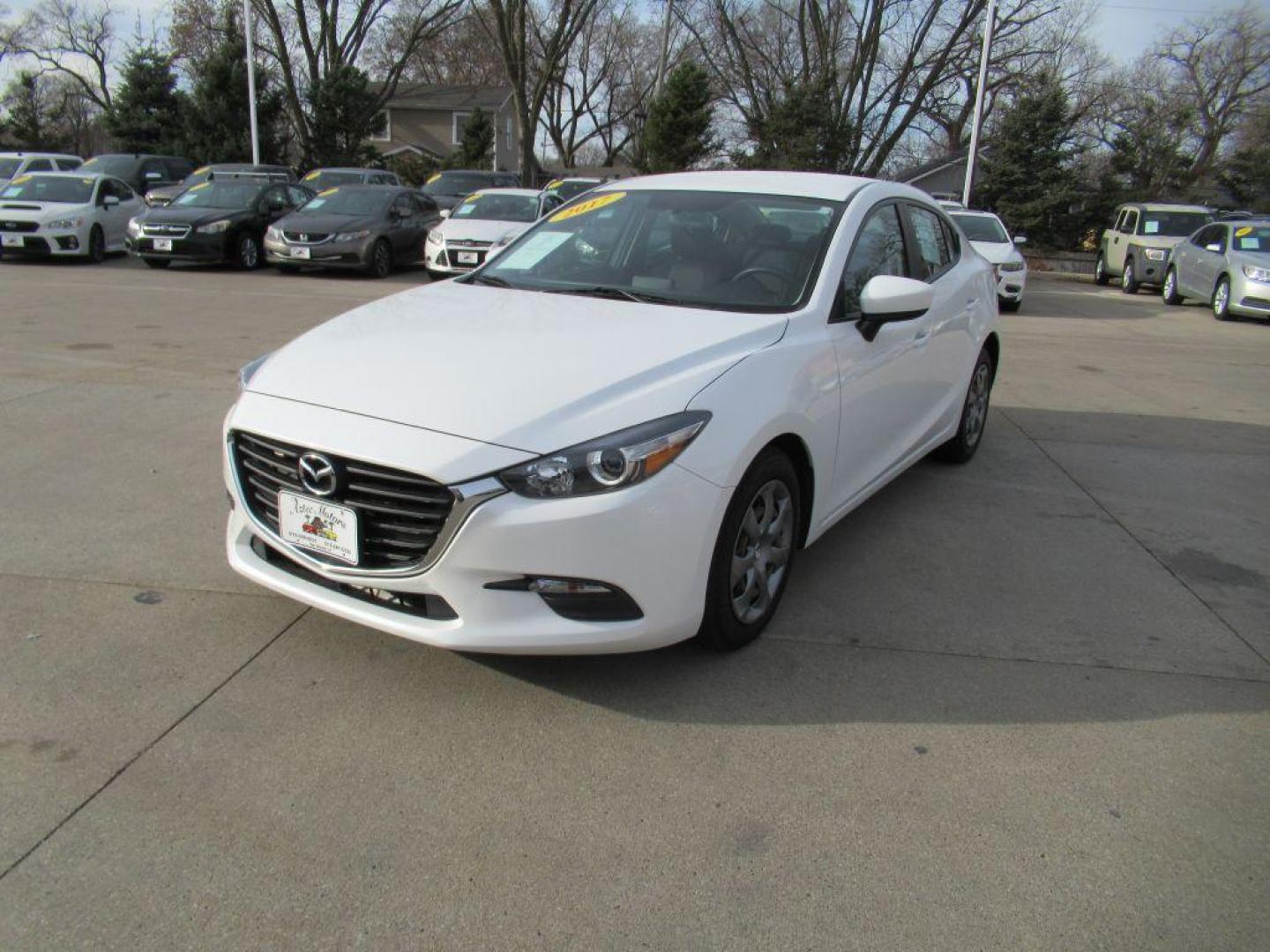 2017 WHITE MAZDA 3 SPORT (JM1BN1U70H1) with an 2.0L engine, 6-Speed Manual transmission, located at 908 SE 14th Street, Des Moines, IA, 50317, (515) 281-0330, 41.580303, -93.597046 - Photo#0