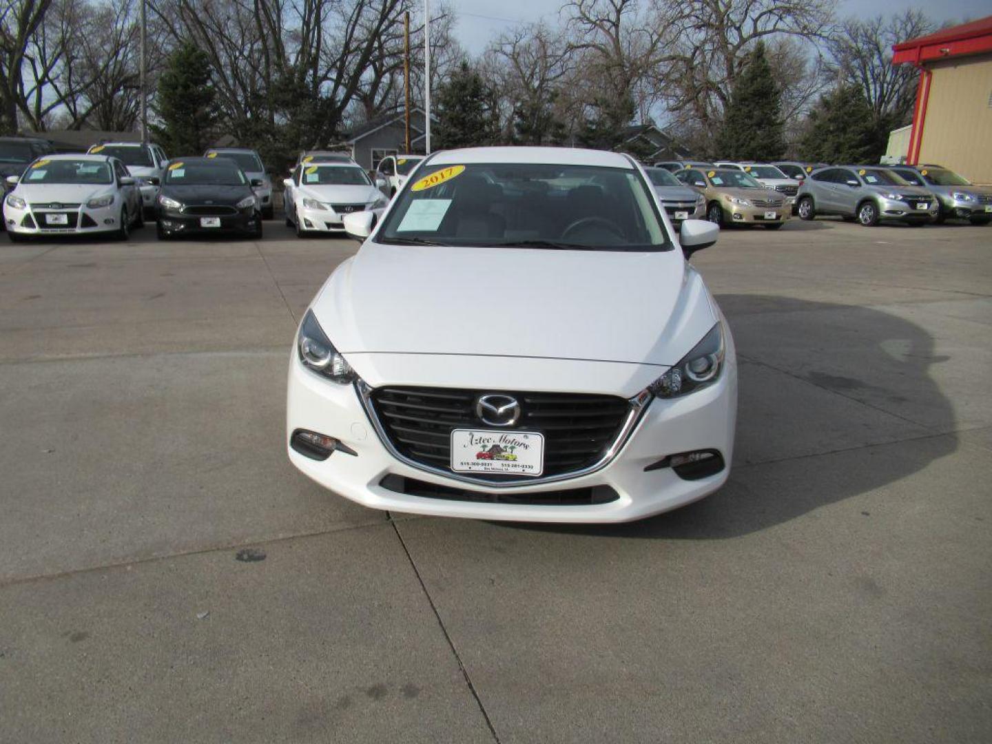 2017 WHITE MAZDA 3 SPORT (JM1BN1U70H1) with an 2.0L engine, 6-Speed Manual transmission, located at 908 SE 14th Street, Des Moines, IA, 50317, (515) 281-0330, 41.580303, -93.597046 - Photo#1