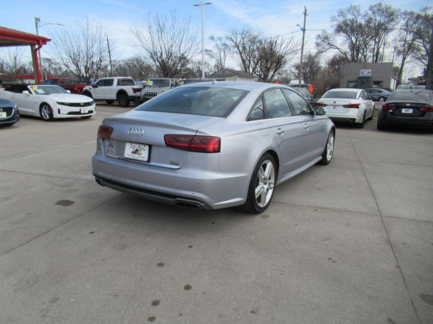 2016 SILVER AUDI A6 PREMIUM PLUS (WAUGFAFC1GN) with an 2.0L engine, Automatic transmission, located at 908 SE 14th Street, Des Moines, IA, 50317, (515) 281-0330, 41.580303, -93.597046 - Photo#4