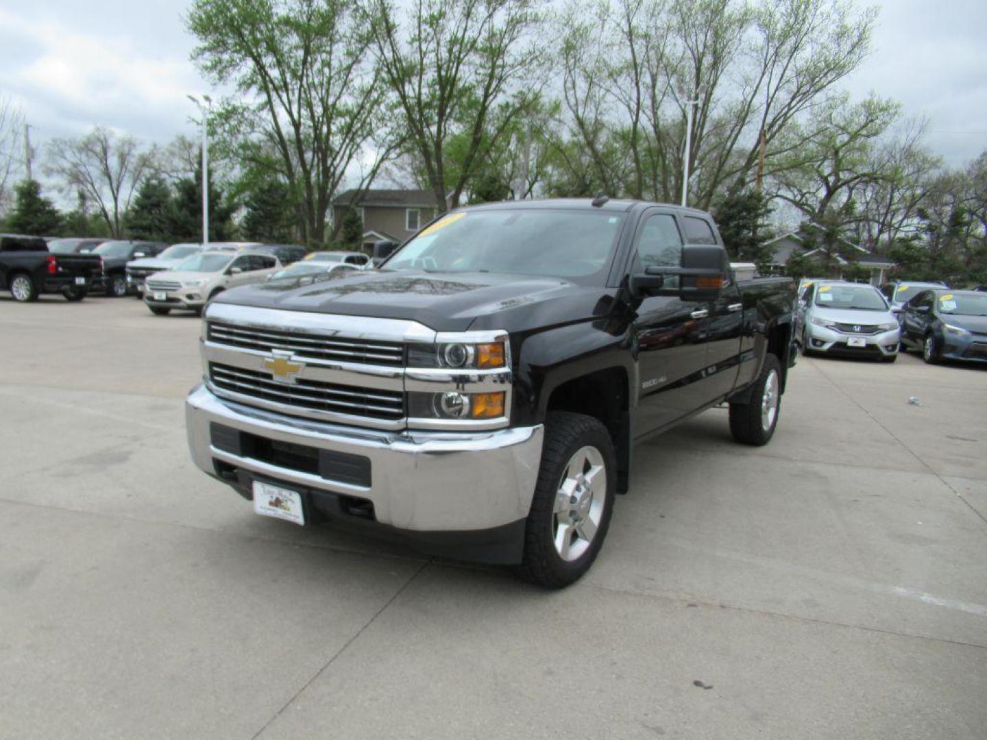 2017 BLACK CHEVROLET SILVERADO 2500 HEAVY DUTY (1GC2KUEG5HZ) with an 6.0L engine, Automatic transmission, located at 908 SE 14th Street, Des Moines, IA, 50317, (515) 281-0330, 41.580303, -93.597046 - Photo#0