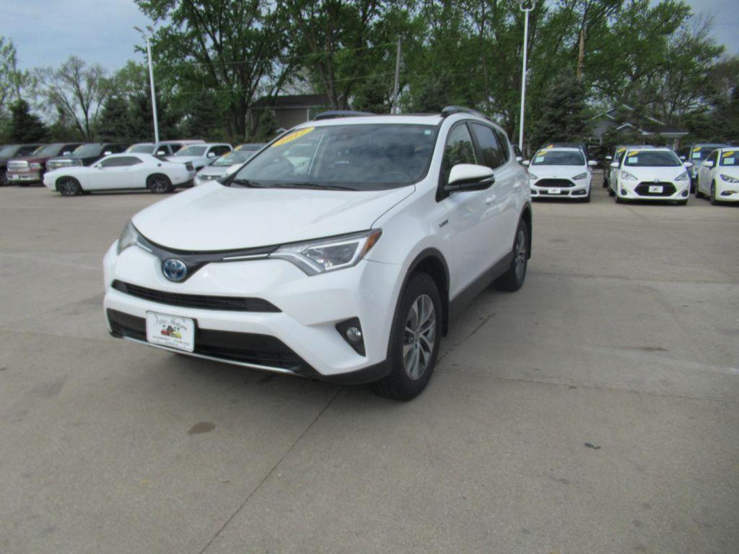 2017 WHITE TOYOTA RAV4 HV LE (JTMRJREV1HD) with an 2.5L engine, Continuously Variable transmission, located at 908 SE 14th Street, Des Moines, IA, 50317, (515) 281-0330, 41.580303, -93.597046 - Photo#0