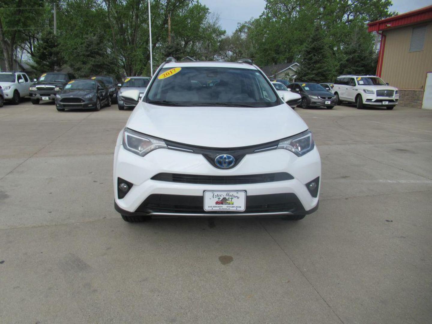 2017 WHITE TOYOTA RAV4 HV LE (JTMRJREV1HD) with an 2.5L engine, Continuously Variable transmission, located at 908 SE 14th Street, Des Moines, IA, 50317, (515) 281-0330, 41.580303, -93.597046 - Photo#1