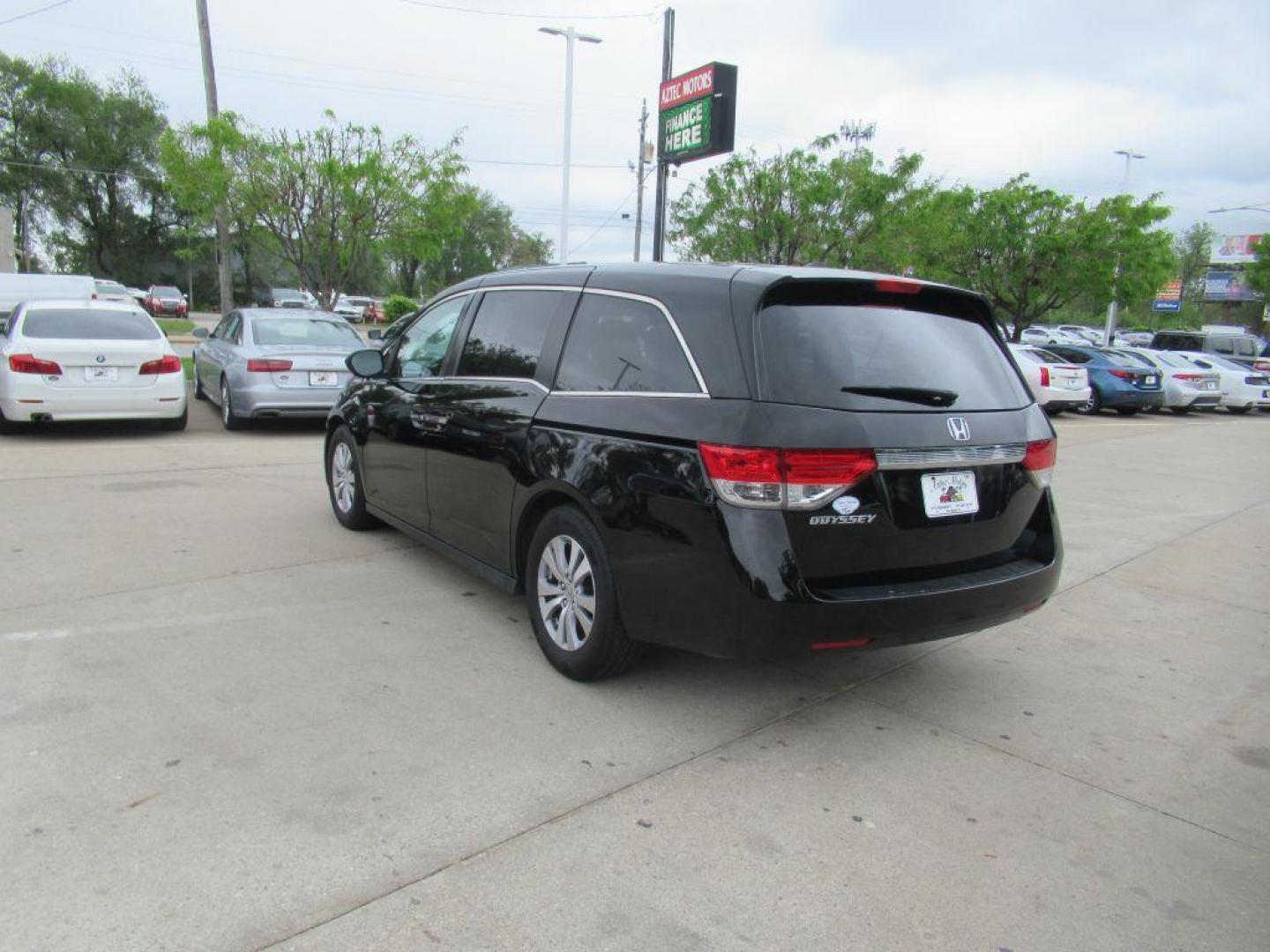 2014 BLACK HONDA ODYSSEY EXL (5FNRL5H64EB) with an 3.5L engine, Automatic transmission, located at 908 SE 14th Street, Des Moines, IA, 50317, (515) 281-0330, 41.580303, -93.597046 - Photo#6