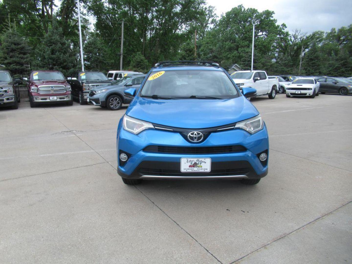 2016 BLUE TOYOTA RAV4 XLE (JTMRFREVXGD) with an 2.5L engine, Automatic transmission, located at 908 SE 14th Street, Des Moines, IA, 50317, (515) 281-0330, 41.580303, -93.597046 - Photo#1