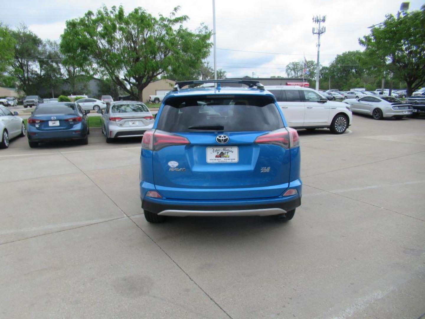 2016 BLUE TOYOTA RAV4 XLE (JTMRFREVXGD) with an 2.5L engine, Automatic transmission, located at 908 SE 14th Street, Des Moines, IA, 50317, (515) 281-0330, 41.580303, -93.597046 - Photo#5