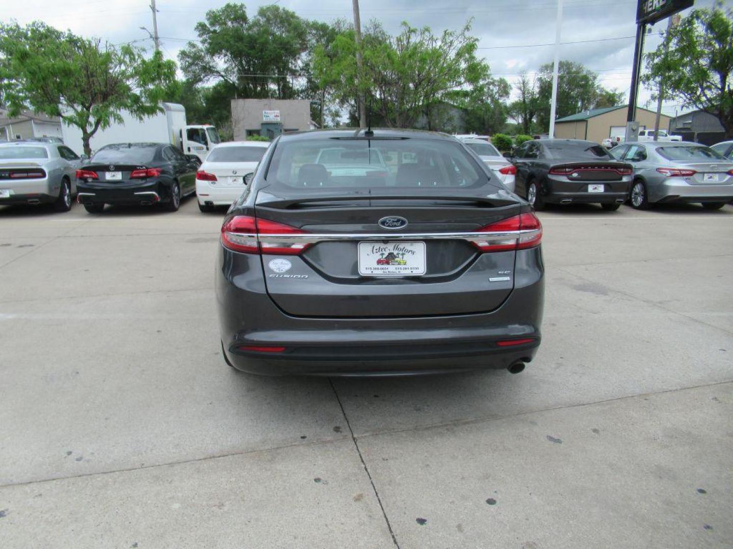 2018 GRAY FORD FUSION SE (3FA6P0HD3JR) with an 1.5L engine, Automatic transmission, located at 908 SE 14th Street, Des Moines, IA, 50317, (515) 281-0330, 41.580303, -93.597046 - Photo#5