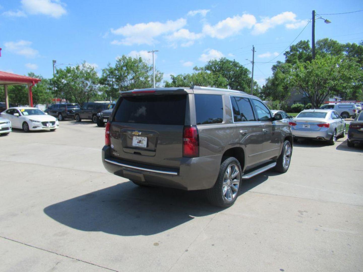 2016 BROWN CHEVROLET TAHOE LTZ (1GNSKCKC7GR) with an 5.3L engine, Automatic transmission, located at 908 SE 14th Street, Des Moines, IA, 50317, (515) 281-0330, 41.580303, -93.597046 - Photo#4