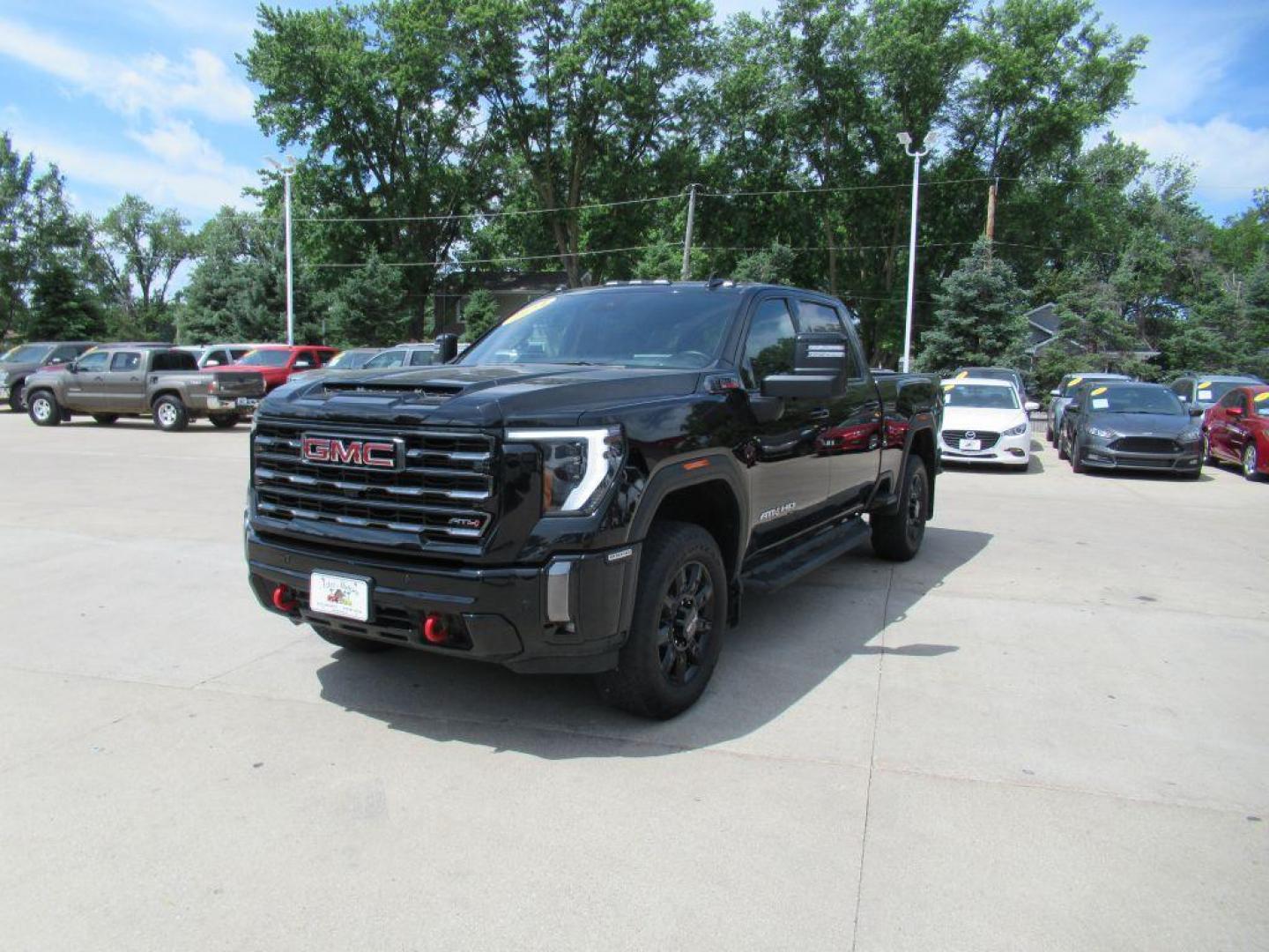 2024 BLACK GMC SIERRA 2500 AT4 (1GT49PEY2RF) with an 6.6L engine, Automatic transmission, located at 908 SE 14th Street, Des Moines, IA, 50317, (515) 281-0330, 41.580303, -93.597046 - Photo#0