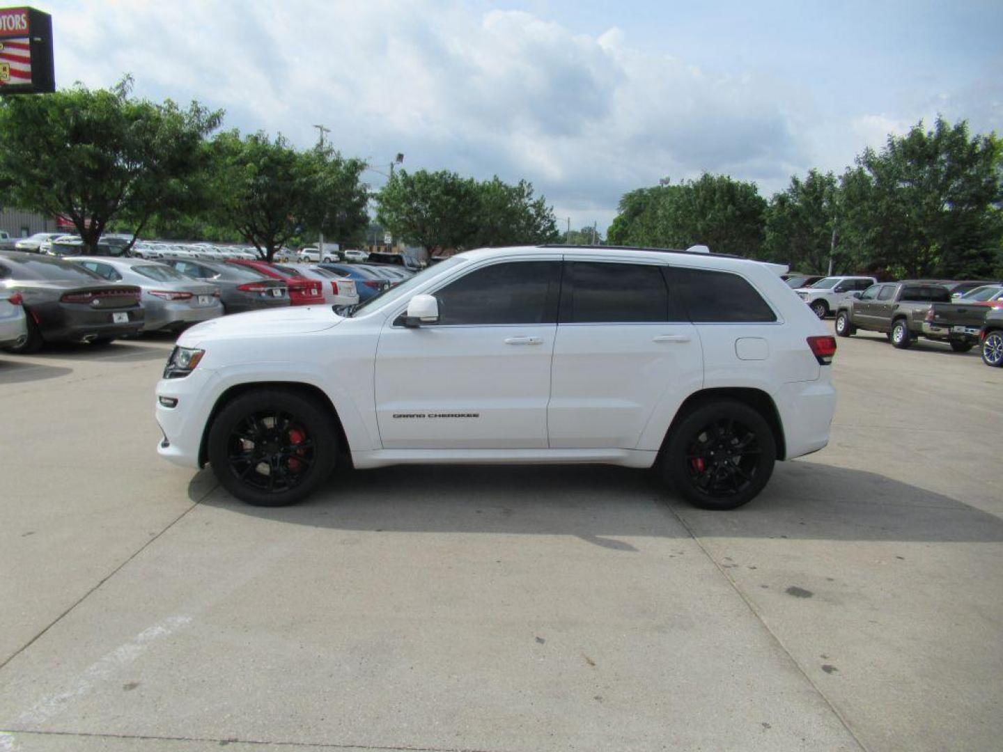 2014 WHITE JEEP GRAND CHEROKEE SRT-8 (1C4RJFDJ0EC) with an 6.4L engine, Automatic transmission, located at 908 SE 14th Street, Des Moines, IA, 50317, (515) 281-0330, 41.580303, -93.597046 - Photo#7