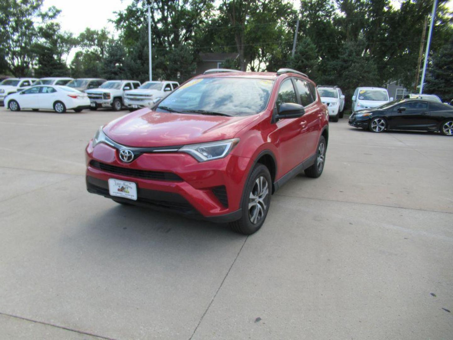 2016 RED TOYOTA RAV4 LE (2T3BFREV7GW) with an 2.5L engine, Automatic transmission, located at 908 SE 14th Street, Des Moines, IA, 50317, (515) 281-0330, 41.580303, -93.597046 - Photo#0