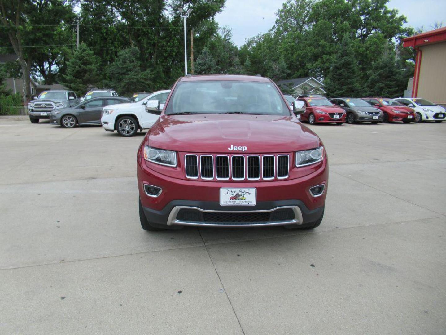 2015 RED JEEP GRAND CHEROKEE LIMITED (1C4RJFBG7FC) with an 3.6L engine, Automatic transmission, located at 908 SE 14th Street, Des Moines, IA, 50317, (515) 281-0330, 41.580303, -93.597046 - Photo#1