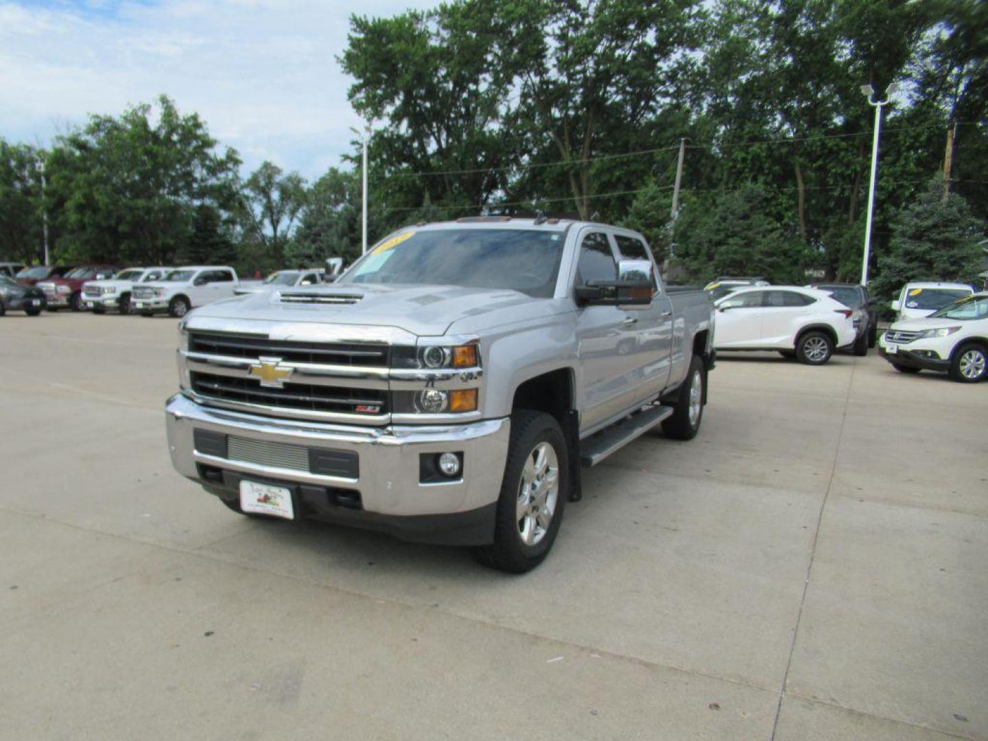 2019 SILVER CHEVROLET SILVERADO 2500 HEAVY DUTY LTZ (1GC1KTEY9KF) with an 6.6L engine, Automatic transmission, located at 908 SE 14th Street, Des Moines, IA, 50317, (515) 281-0330, 41.580303, -93.597046 - Photo#0