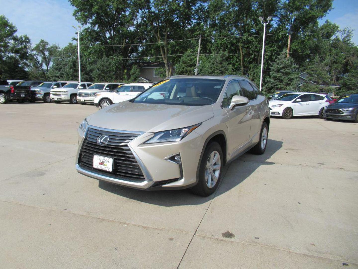 2016 TAN LEXUS RX 350 BASE (2T2BZMCA1GC) with an 3.5L engine, Automatic transmission, located at 908 SE 14th Street, Des Moines, IA, 50317, (515) 281-0330, 41.580303, -93.597046 - Photo#0