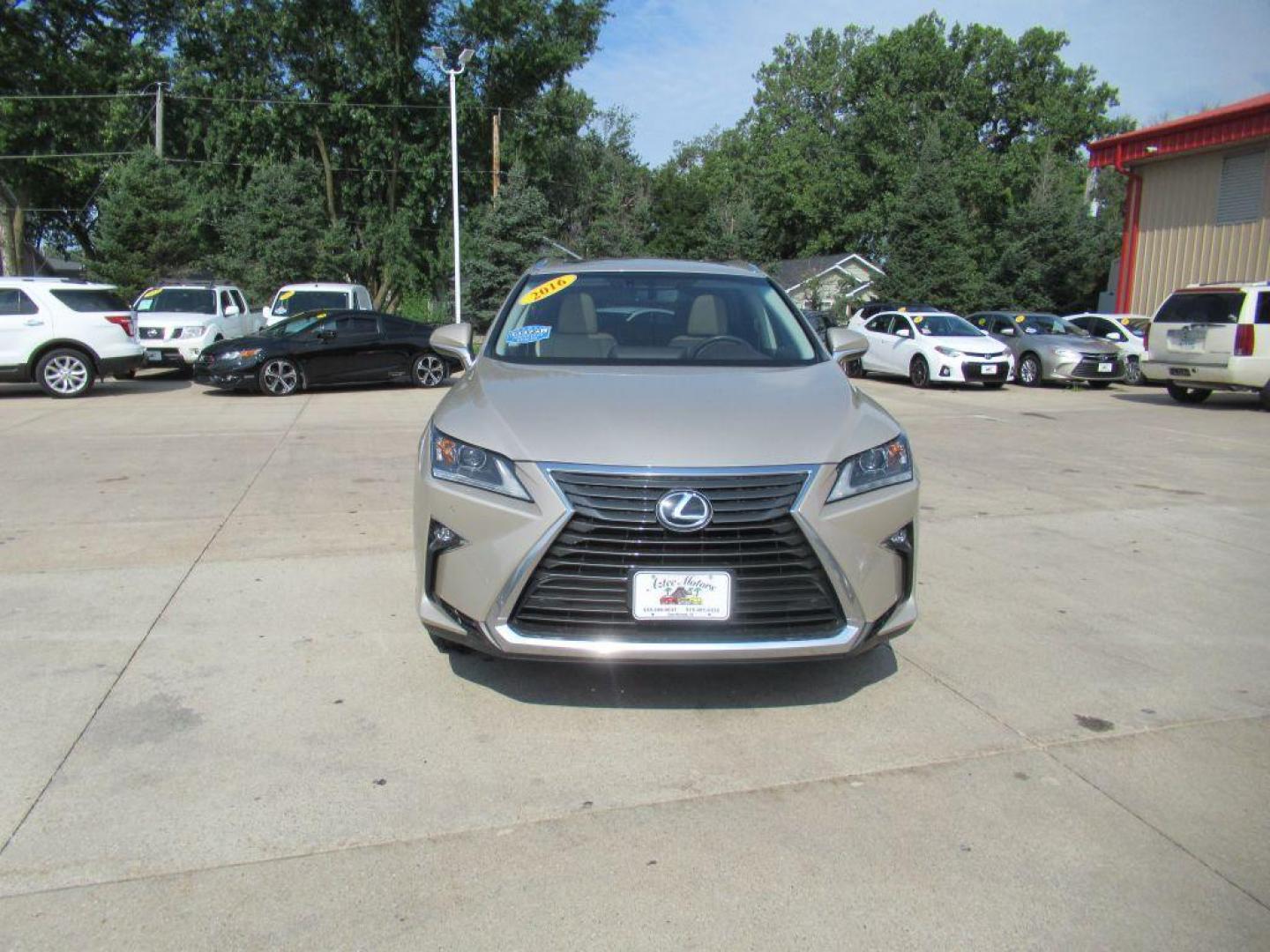 2016 TAN LEXUS RX 350 BASE (2T2BZMCA1GC) with an 3.5L engine, Automatic transmission, located at 908 SE 14th Street, Des Moines, IA, 50317, (515) 281-0330, 41.580303, -93.597046 - Photo#1