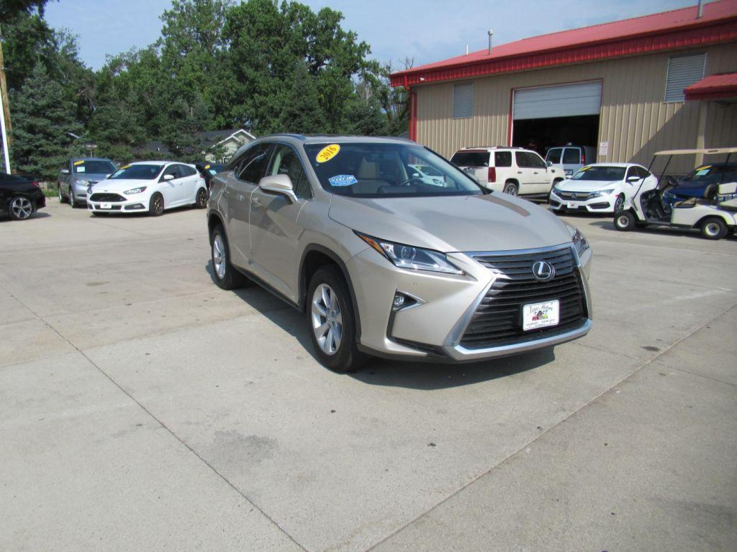 2016 TAN LEXUS RX 350 BASE (2T2BZMCA1GC) with an 3.5L engine, Automatic transmission, located at 908 SE 14th Street, Des Moines, IA, 50317, (515) 281-0330, 41.580303, -93.597046 - Photo#2