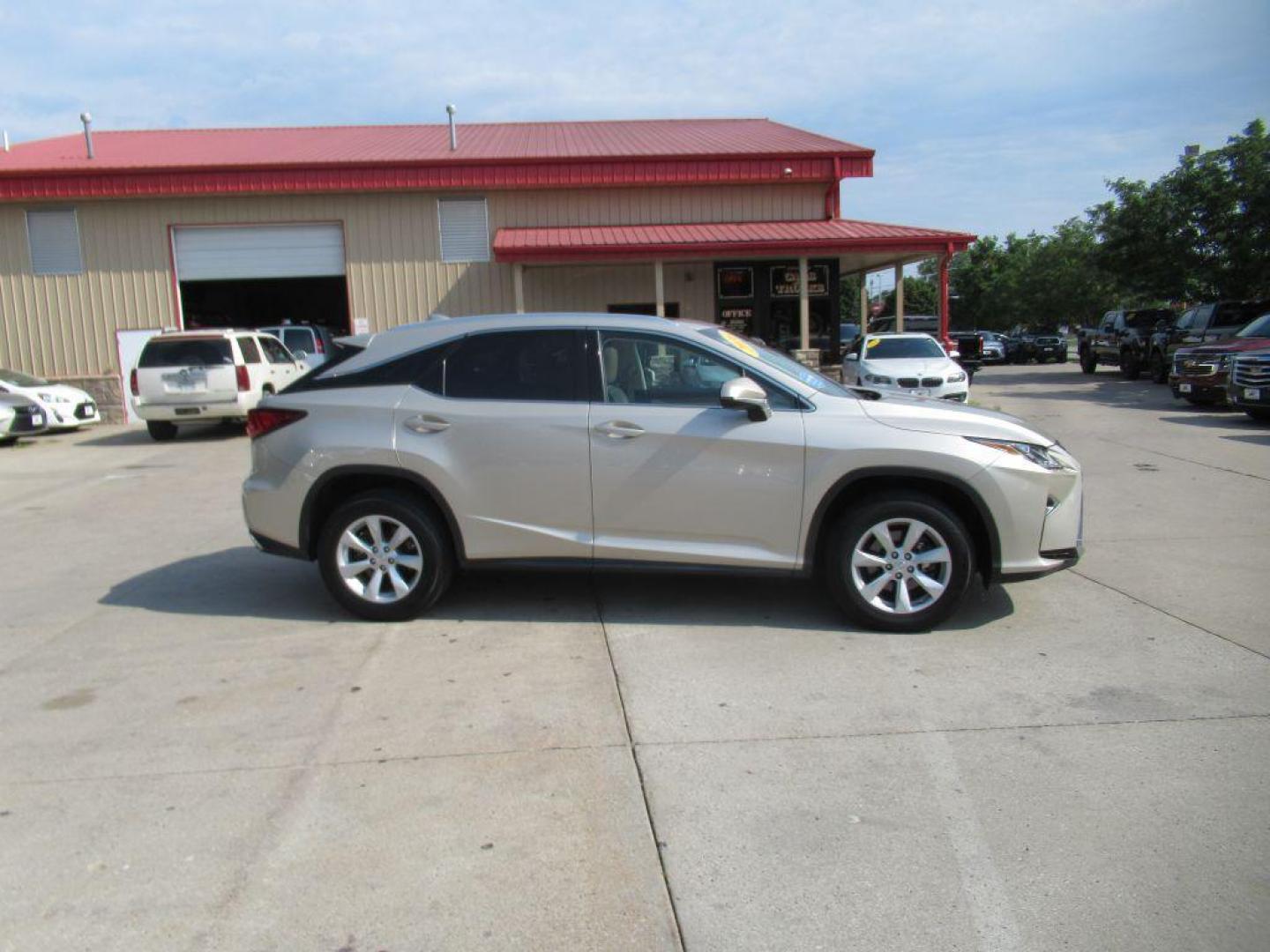 2016 TAN LEXUS RX 350 BASE (2T2BZMCA1GC) with an 3.5L engine, Automatic transmission, located at 908 SE 14th Street, Des Moines, IA, 50317, (515) 281-0330, 41.580303, -93.597046 - Photo#3