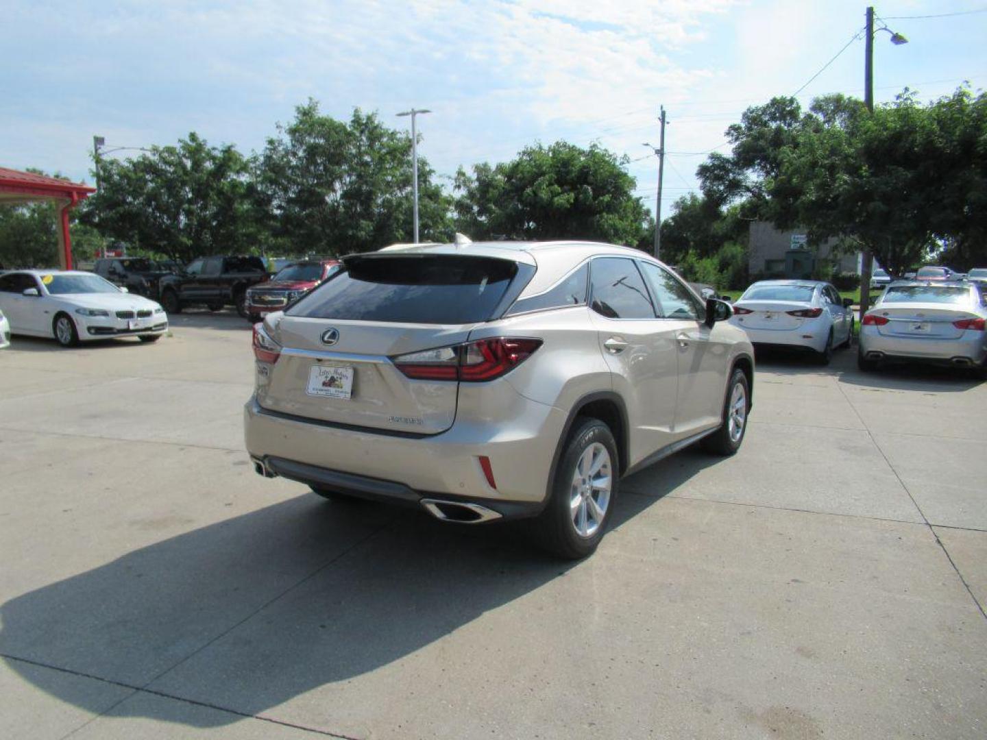 2016 TAN LEXUS RX 350 BASE (2T2BZMCA1GC) with an 3.5L engine, Automatic transmission, located at 908 SE 14th Street, Des Moines, IA, 50317, (515) 281-0330, 41.580303, -93.597046 - Photo#4