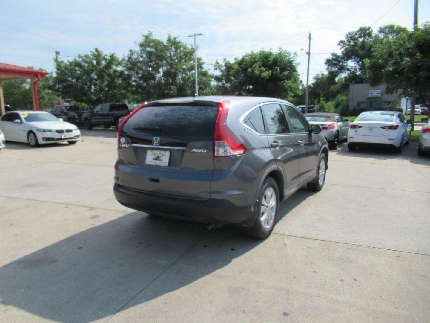 2012 GRAY HONDA CR-V EXL (5J6RM4H72CL) with an 2.4L engine, Automatic transmission, located at 908 SE 14th Street, Des Moines, IA, 50317, (515) 281-0330, 41.580303, -93.597046 - Photo#4