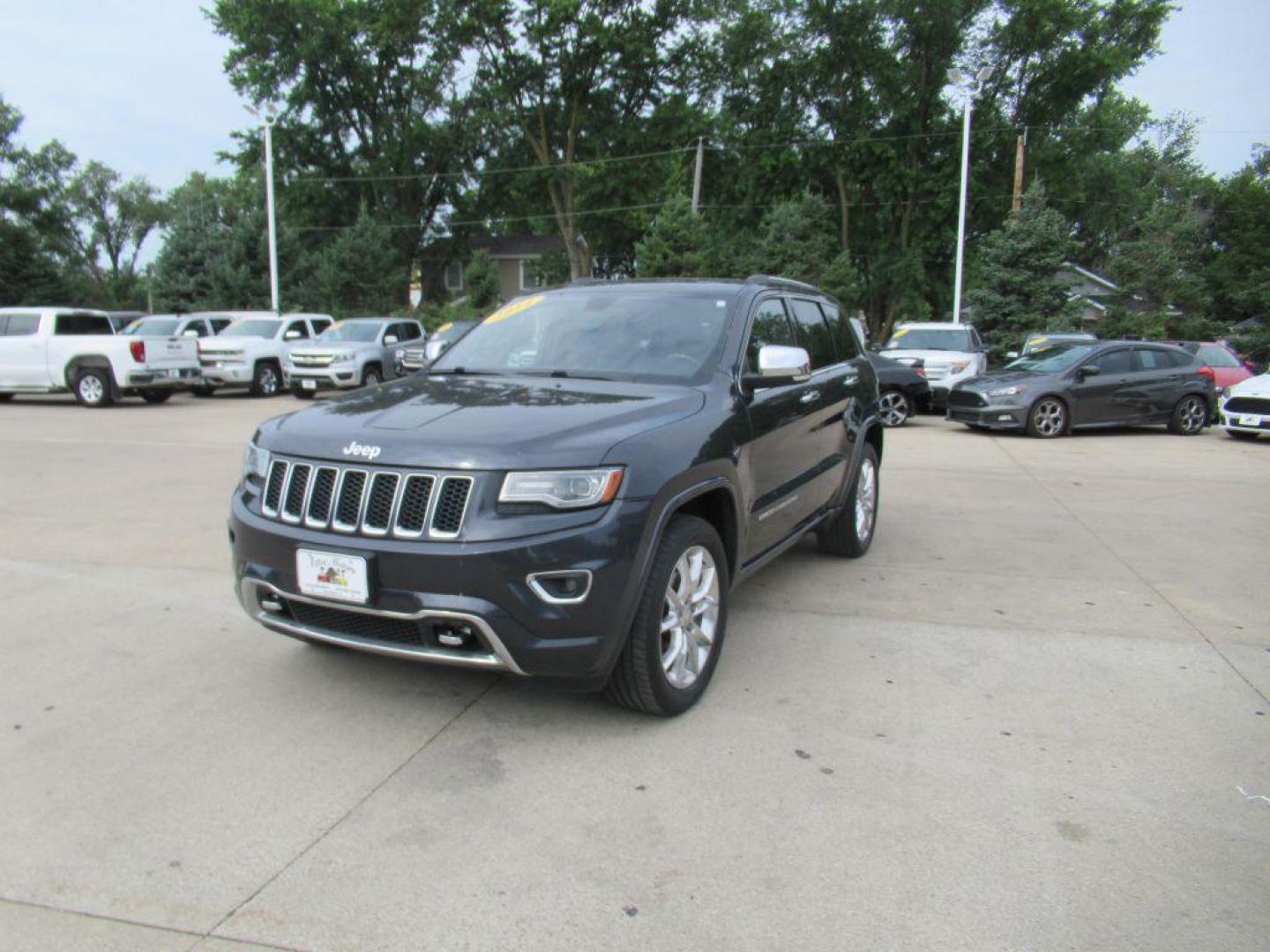 2014 BLACK JEEP GRAND CHEROKEE OVERLAND (1C4RJFCG5EC) with an 3.6L engine, Automatic transmission, located at 908 SE 14th Street, Des Moines, IA, 50317, (515) 281-0330, 41.580303, -93.597046 - Photo#0