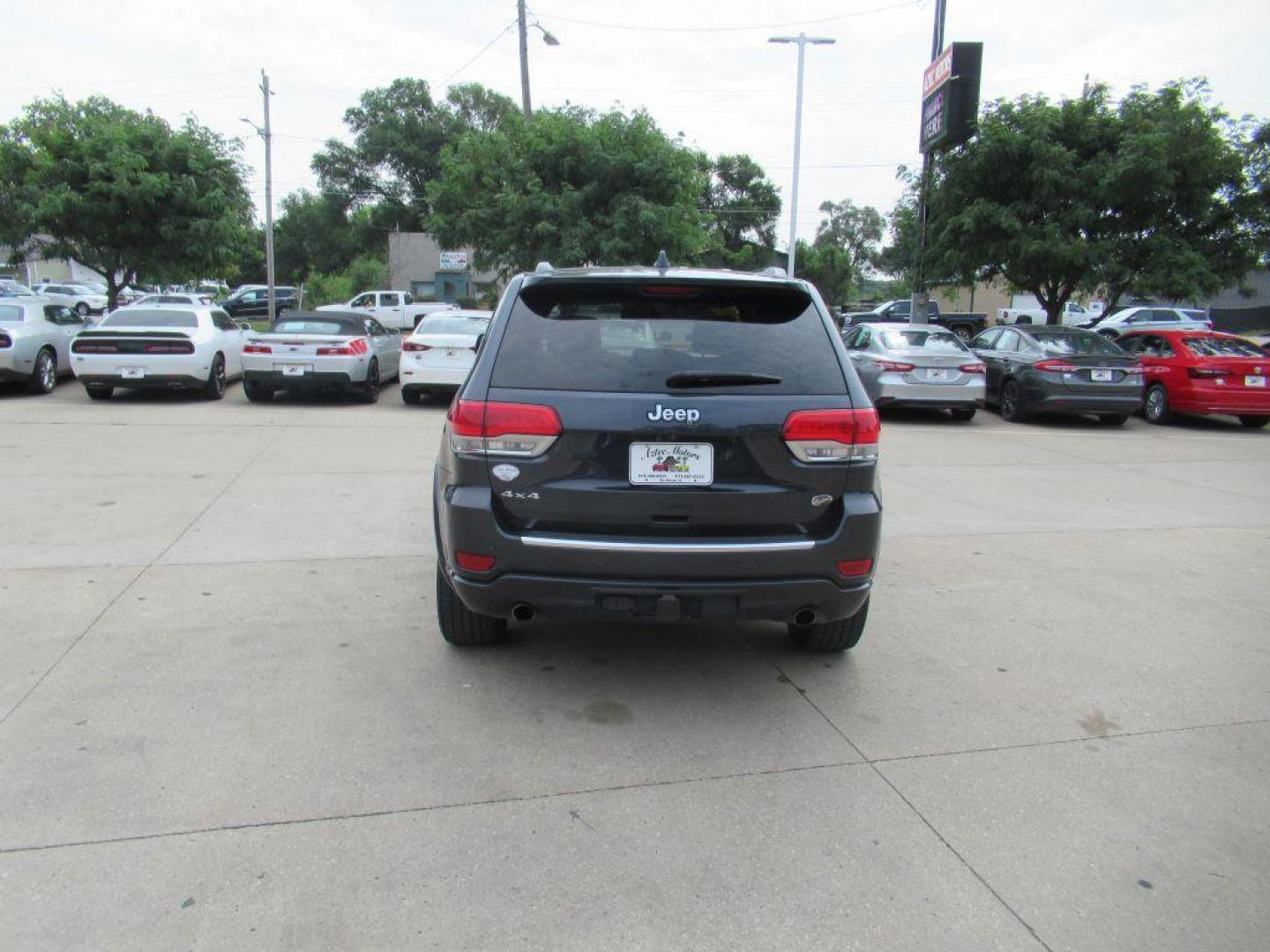 2014 BLACK JEEP GRAND CHEROKEE OVERLAND (1C4RJFCG5EC) with an 3.6L engine, Automatic transmission, located at 908 SE 14th Street, Des Moines, IA, 50317, (515) 281-0330, 41.580303, -93.597046 - Photo#5