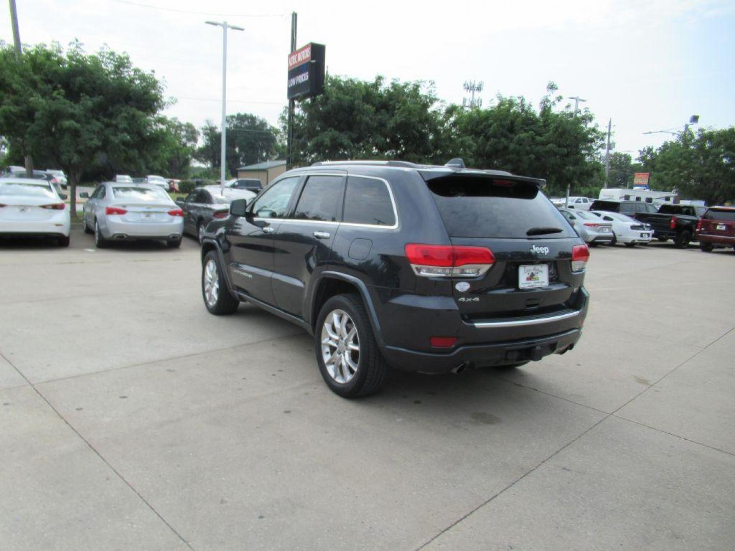 2014 BLACK JEEP GRAND CHEROKEE OVERLAND (1C4RJFCG5EC) with an 3.6L engine, Automatic transmission, located at 908 SE 14th Street, Des Moines, IA, 50317, (515) 281-0330, 41.580303, -93.597046 - Photo#6