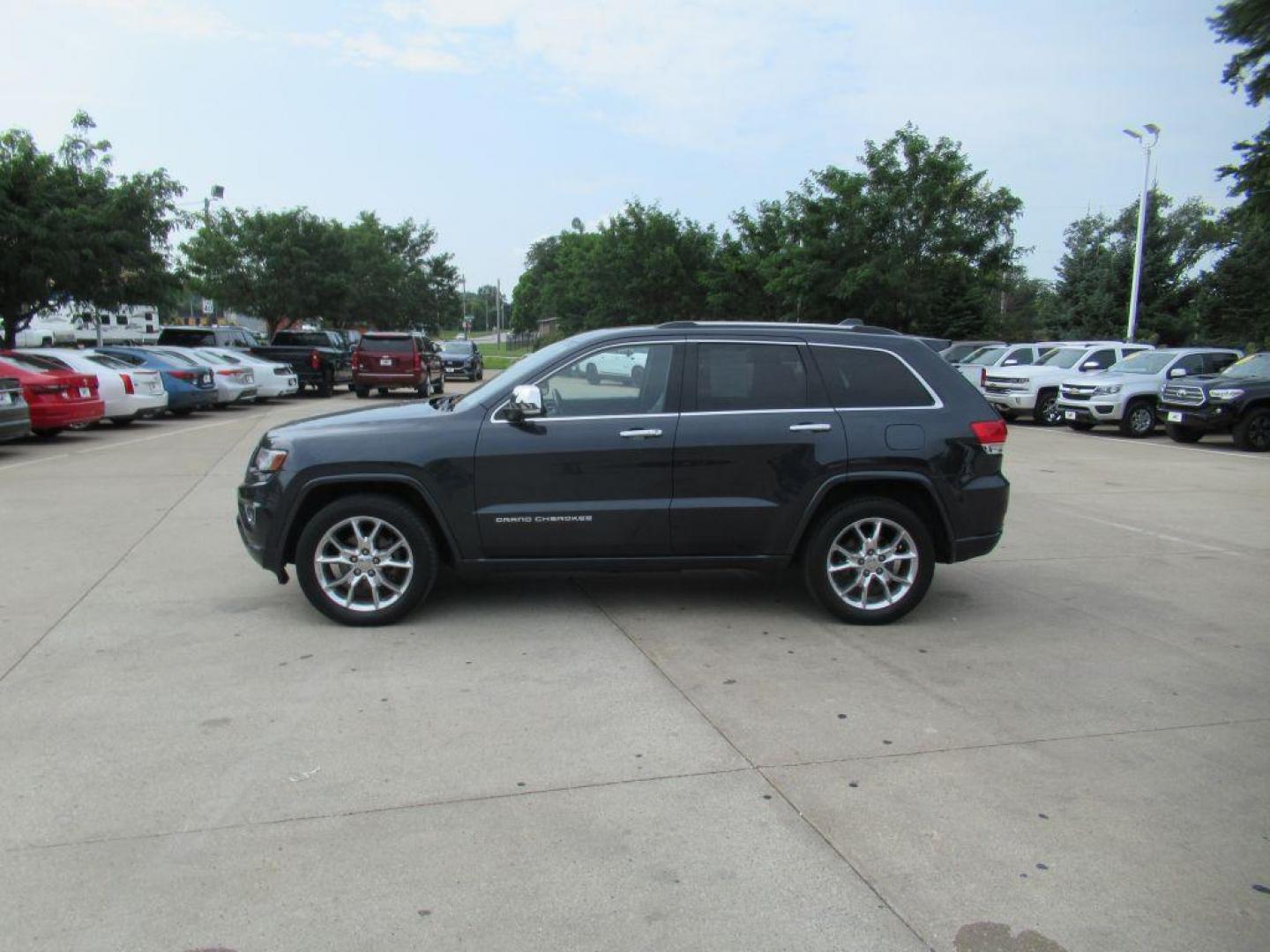 2014 BLACK JEEP GRAND CHEROKEE OVERLAND (1C4RJFCG5EC) with an 3.6L engine, Automatic transmission, located at 908 SE 14th Street, Des Moines, IA, 50317, (515) 281-0330, 41.580303, -93.597046 - Photo#7