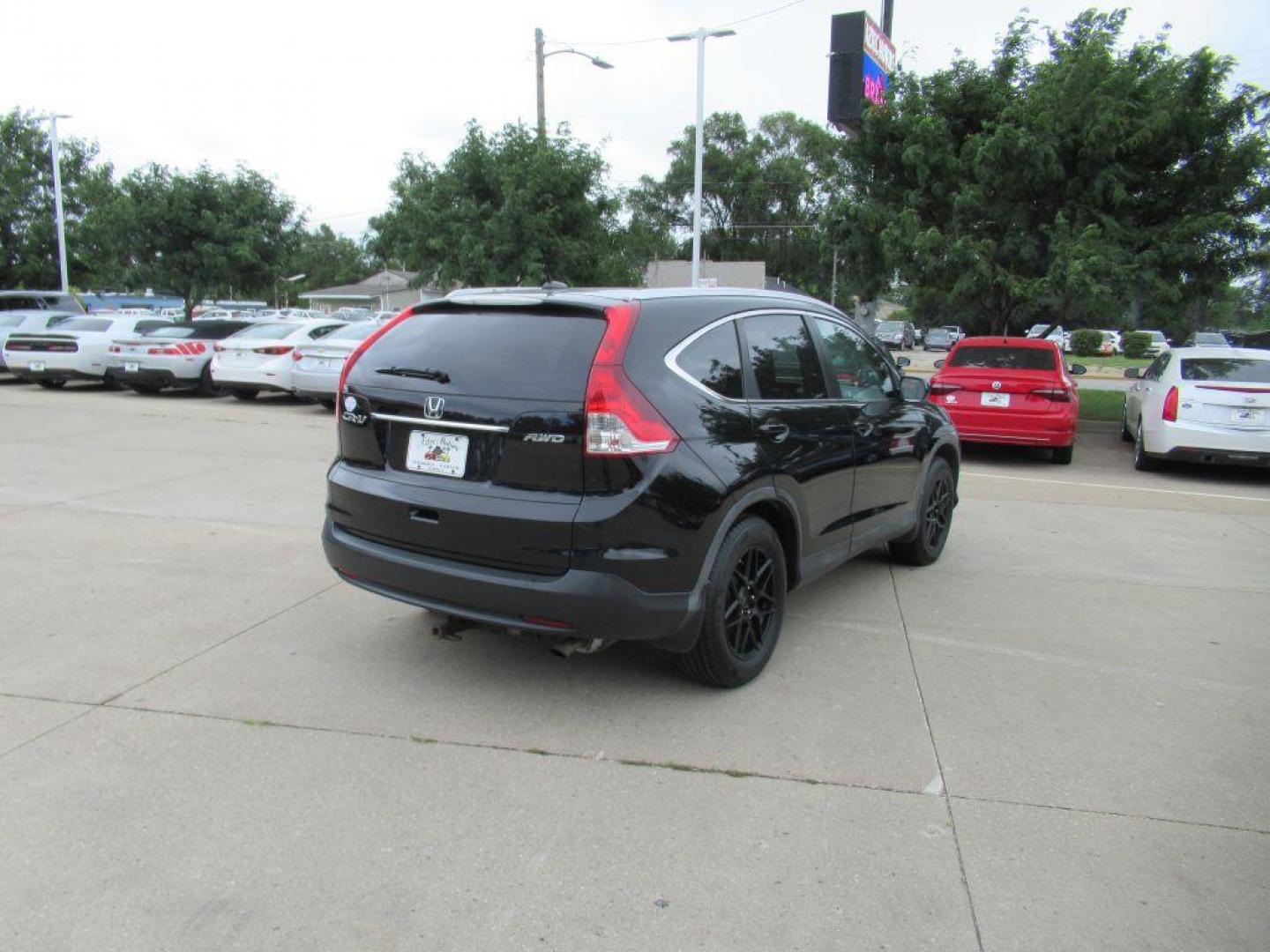 2012 BLACK HONDA CR-V EXL (5J6RM4H78CL) with an 2.4L engine, Automatic transmission, located at 908 SE 14th Street, Des Moines, IA, 50317, (515) 281-0330, 41.580303, -93.597046 - Photo#4