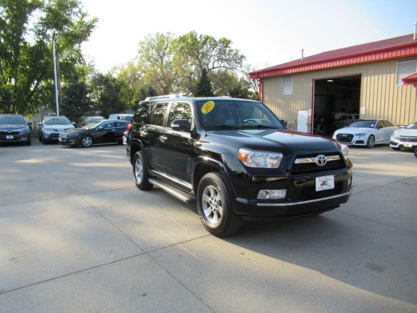 2013 BLACK TOYOTA 4RUNNER SR5 (JTEBU5JR7D5) with an 4.0L engine, Automatic transmission, located at 908 SE 14th Street, Des Moines, IA, 50317, (515) 281-0330, 41.580303, -93.597046 - Photo#2