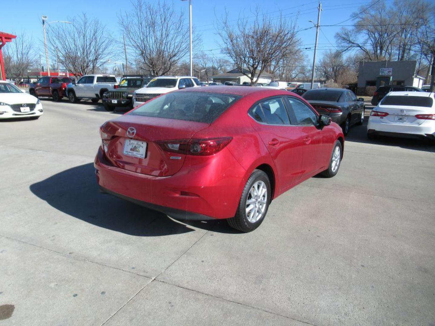 2017 RED MAZDA 3 SPORT (3MZBN1U72HM) with an 2.0L engine, 6-Speed Manual transmission, located at 908 SE 14th Street, Des Moines, IA, 50317, (515) 281-0330, 41.580303, -93.597046 - Photo#4