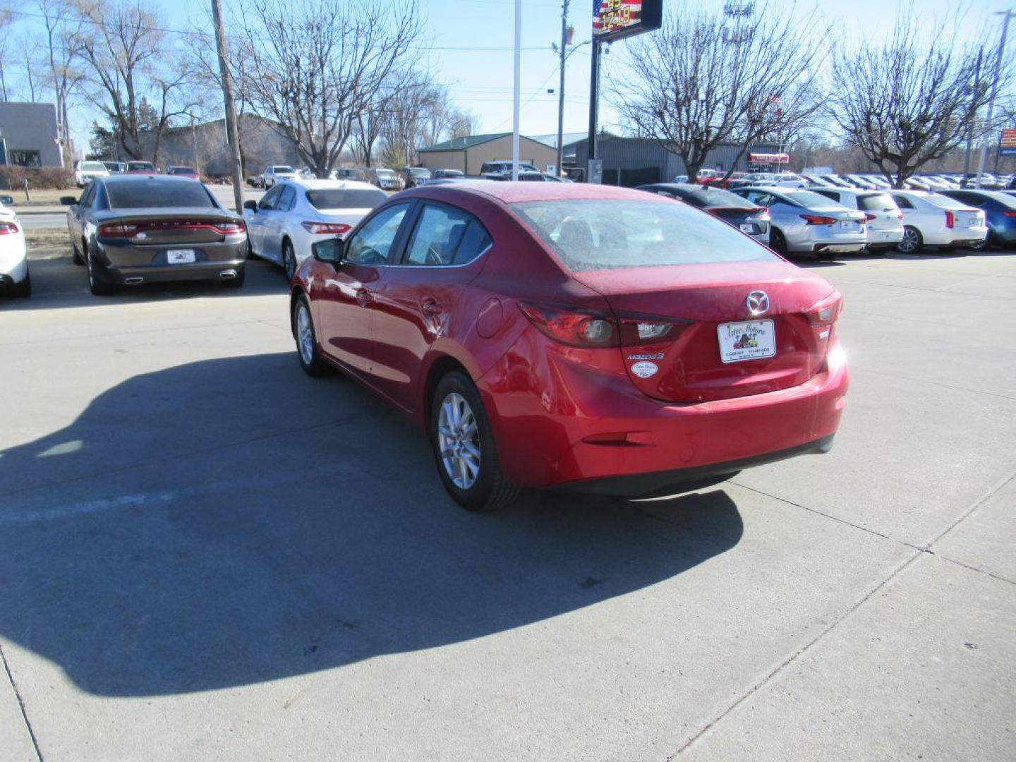 2017 RED MAZDA 3 SPORT (3MZBN1U72HM) with an 2.0L engine, 6-Speed Manual transmission, located at 908 SE 14th Street, Des Moines, IA, 50317, (515) 281-0330, 41.580303, -93.597046 - Photo#6