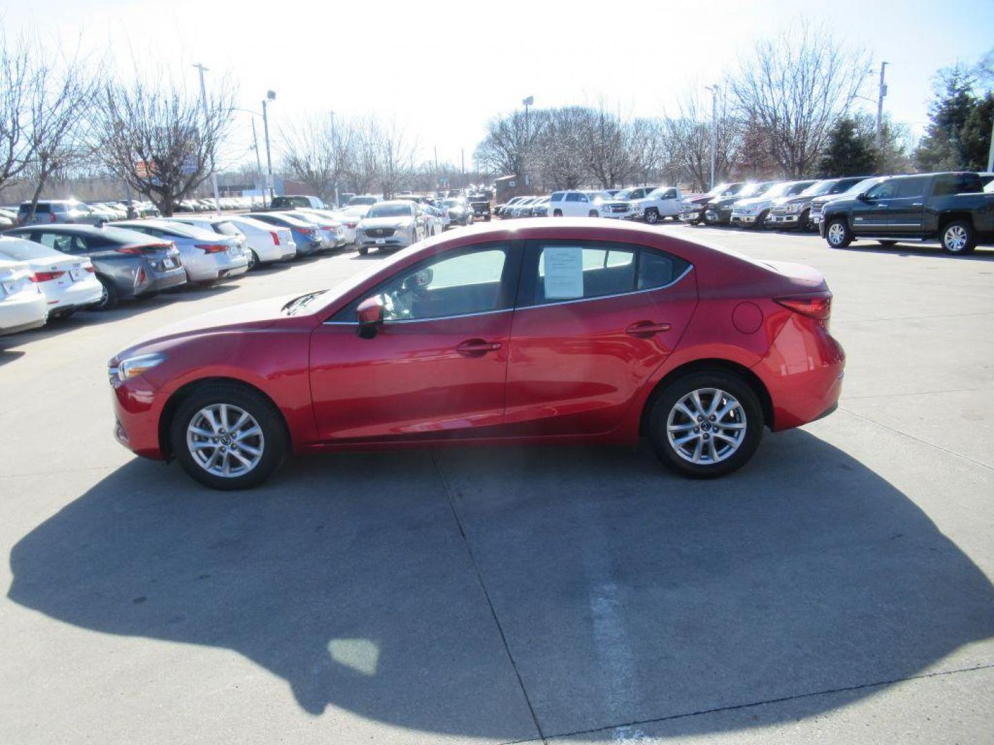 2017 RED MAZDA 3 SPORT (3MZBN1U72HM) with an 2.0L engine, 6-Speed Manual transmission, located at 908 SE 14th Street, Des Moines, IA, 50317, (515) 281-0330, 41.580303, -93.597046 - Photo#7